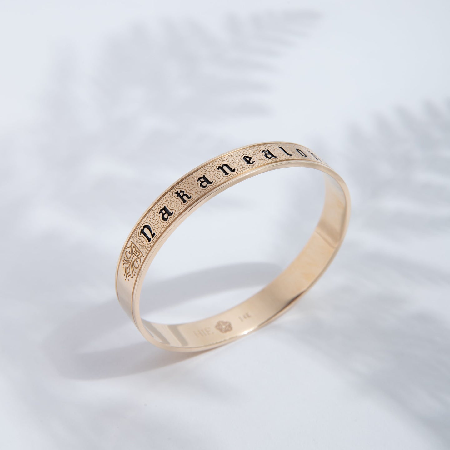 Hie Amelia Ana 10mm bangle bracelet in gold, standing upright