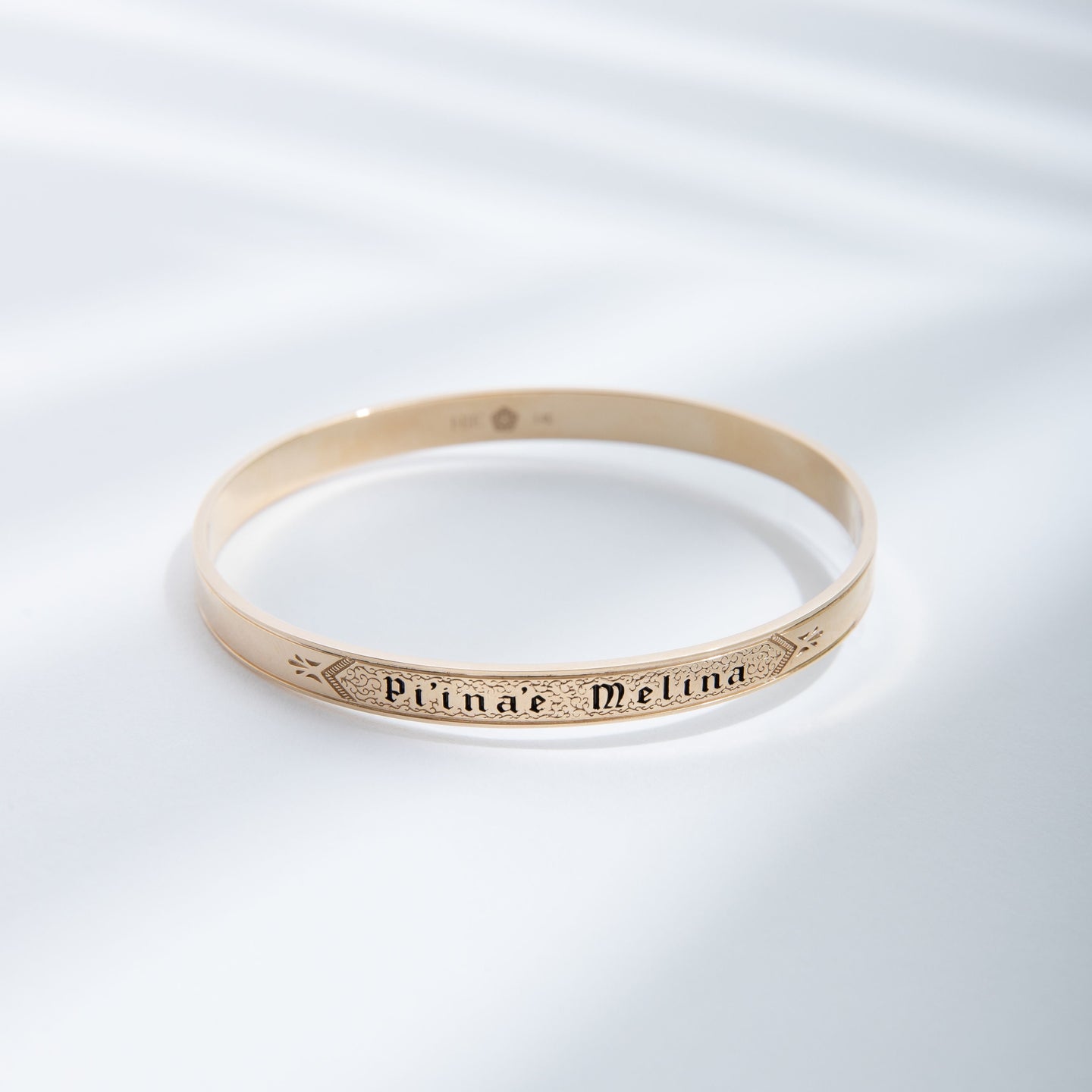 Hie Li’ili’i gold bangle bracelet with engraving