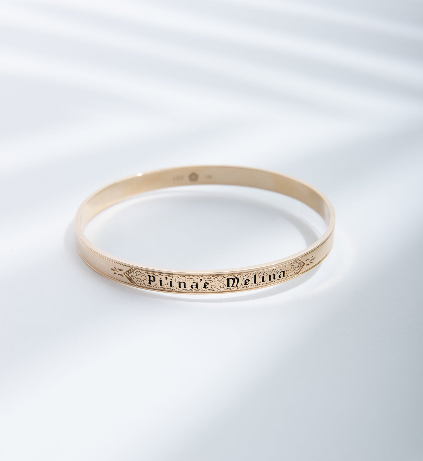 Hie Li’ili’i gold bangle bracelet with engraving